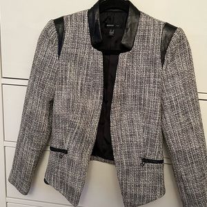 Tweed style blazer with leather detail from Mango